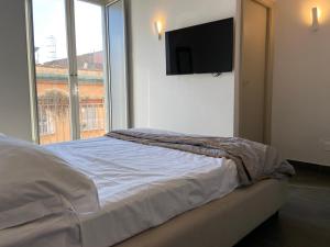 Postel nebo postele na pokoji v ubytování Jazz Hotel