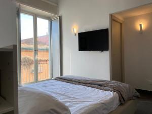 Postel nebo postele na pokoji v ubytování Jazz Hotel