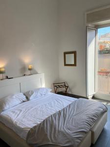 Postel nebo postele na pokoji v ubytování Jazz Hotel