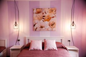 A bed or beds in a room at Ca' Valentina