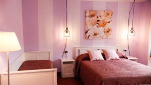 A bed or beds in a room at Ca' Valentina