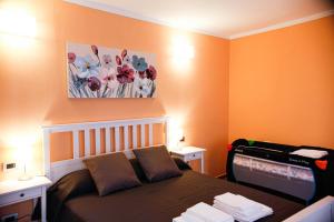 A bed or beds in a room at Ca' Valentina