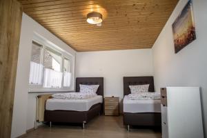 Postel nebo postele na pokoji v ubytování Gasthaus Kranz