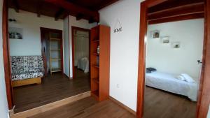 Łóżko lub łóżka w pokoju w obiekcie Casa Rural La Resbala - Casa Tajinaste