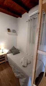 Łóżko lub łóżka w pokoju w obiekcie Casa Rural La Resbala - Casa Tajinaste