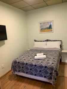 Cama ou camas em um quarto em Vila Stellino Suítes
