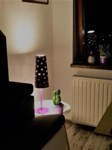 Posedenie v ubytovaní Apartament przy Źródełku