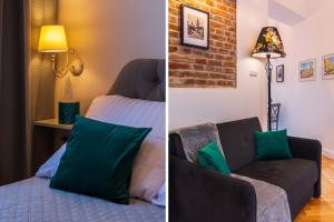 Posteľ alebo postele v izbe v ubytovaní Apartamenty Rejtana