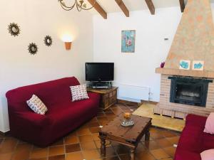 TV a/nebo společenská místnost v ubytování Casa los Almendros
