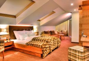 Posteľ alebo postele v izbe v ubytovaní Hotel Garni Urezza