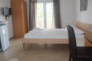 TV a/nebo společenská místnost v ubytování Apartment's Meti
