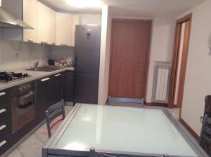 Virtuvė arba virtuvėlė apgyvendinimo įstaigoje Perla nelle Orobie
