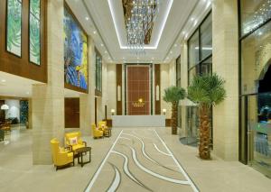 De lobby of receptie bij Lemon Tree Premier, Dwarka