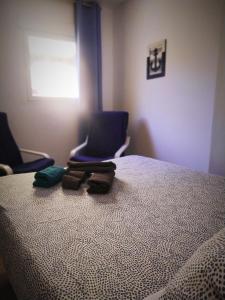 Posteľ alebo postele v izbe v ubytovaní Hostal Casa Nautilus