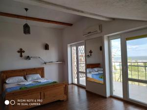 Postel nebo postele na pokoji v ubytování Druzhba 598