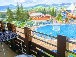 a view of a pool at a water park at Apartament 325 in Bešeňová