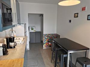 Et opholdsområde på Appartement Forum Reims + 7 billeder