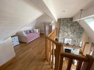 Postel nebo postele na pokoji v ubytování BaySide Cottage Connemara