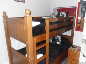 a couple of bunk beds in a room at Bradleys Hotel in Blackpool