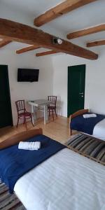 Postel nebo postele na pokoji v ubytování EVA HOUSE