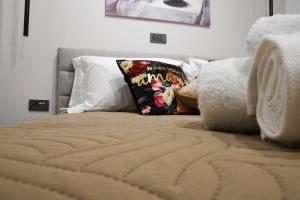 Postel nebo postele na pokoji v ubytování Orion Eco Suites