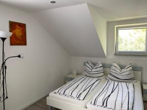 Ein Bett oder Betten in einem Zimmer der Unterkunft Ossiach Apartment 1