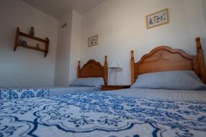 Ein Bett oder Betten in einem Zimmer der Unterkunft Villa Javi