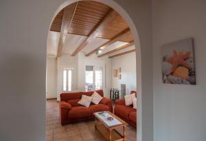 Ein Sitzbereich in der Unterkunft Villa Javi