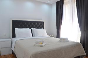 Postel nebo postele na pokoji v ubytování Andaluni Beach Apartments