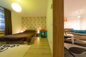 Łóżko lub łóżka w pokoju w obiekcie Terezianum Apartments, Free Parking
