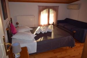 Posteľ alebo postele v izbe v ubytovaní Family Villa Kalypso