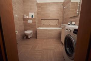 Kúpeľňa v ubytovaní Apartman A&M