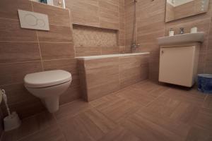 Kúpeľňa v ubytovaní Apartman A&M