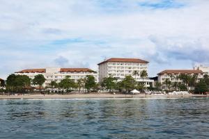 a view of a resort from the water at Hotel Jequitimar Guaruja Resort & Spa by Accor - Ex Sofitel in Guarujá
