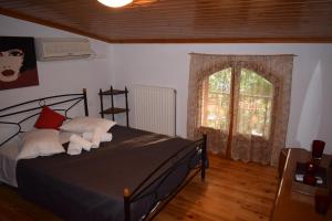 Posteľ alebo postele v izbe v ubytovaní Family Villa Kalypso