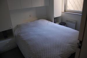 Een bed of bedden in een kamer bij New Line
