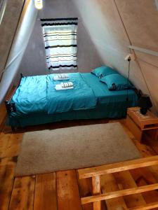 Krevet ili kreveti u jedinici u okviru objekta Apartmani Radaković