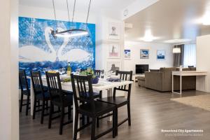 
A restaurant or other place to eat at Rovaniemi City Apartments
