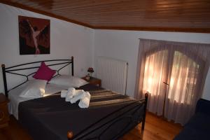 Posteľ alebo postele v izbe v ubytovaní Family Villa Kalypso