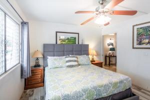 Кровать или кровати в номере Maui Vista - Kihei Kai Nani Beach Condos