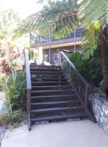a staircase leading up to a house with a building at Tunnel Ridge Outlook in Mooloolah