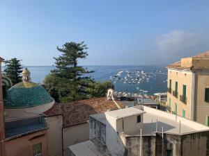 a view of the harbor from the roofs of buildings at Casa Ester e Antonella in Maiori