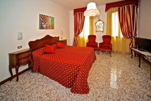 TV a/nebo společenská místnost v ubytování Hotel Fontana
