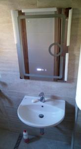 Koupelna v ubytování Dima apartment + 10 fotografií