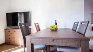 TV a/nebo společenská místnost v ubytování Rooms & Apartments Toni