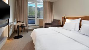 Ein Bett oder Betten in einem Zimmer der Unterkunft OREA Resort Horal Špindlerův Mlýn