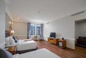 TV a/nebo společenská místnost v ubytování AVS Hotel Phu Quoc