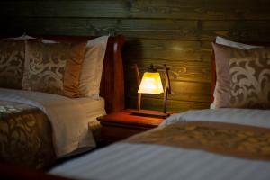 Postel nebo postele na pokoji v ubytování Mountain Resort Ždiar - Chalets