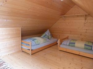 Postel nebo postele na pokoji v ubytování Almhaus Blümel