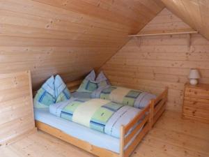 Postel nebo postele na pokoji v ubytování Almhaus Blümel